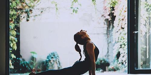 photo of a woman doing yoga